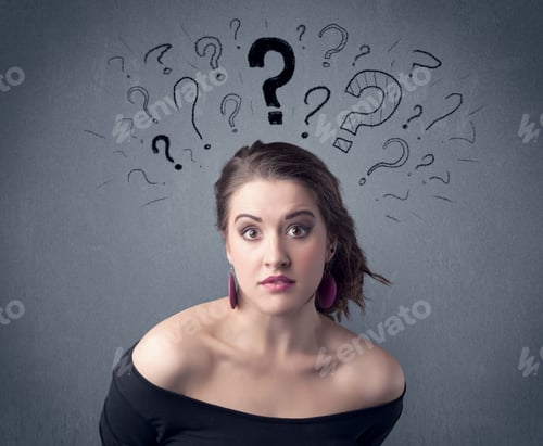 Preview: A Pretty Teenage Girl Standing Confused In Front Of Grey Wall Background With Drawn Question Marks