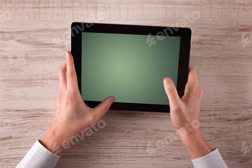 Preview: Caucasian Business Hands Holding And Working On Plain Tablet