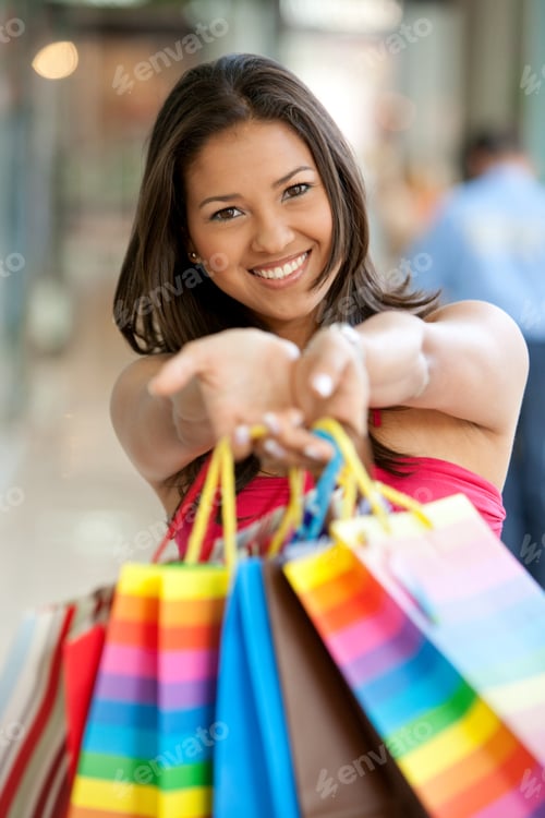 Preview: Shopping Woman Holding Some Bags In Front Of Her Face