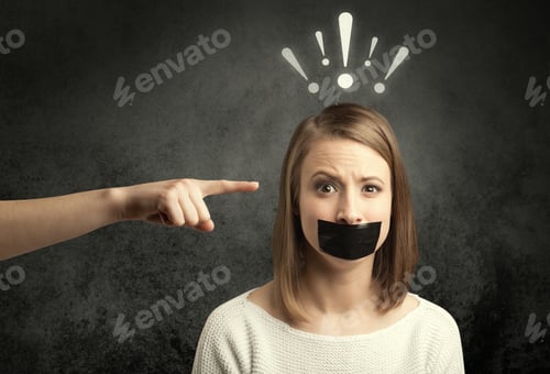Preview: Caucasian Hand Pointing At Female Employee With Drawn Exclamation Marks Above Her Head
