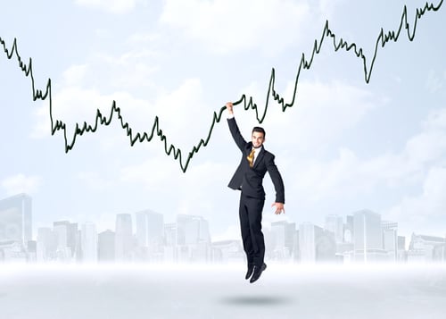 Preview: Businessman Hanging On A Graph Rope