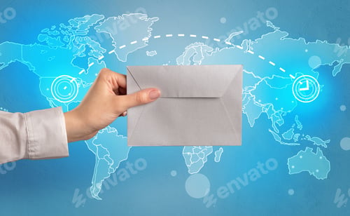 Preview: Female Hand Holding Coloured And White Envelope With Blue Map On The Background