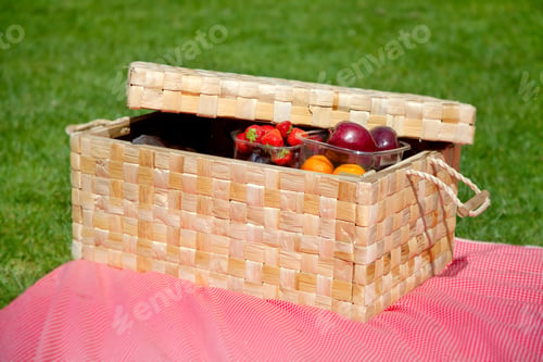 Preview: Basket Of Fruits On The Floor Outdoors