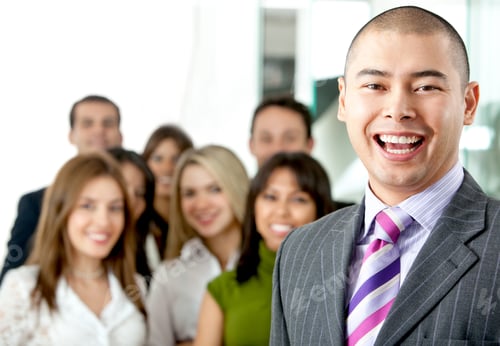 Vista previa: Business Man Smiling Leading A Team In An Office