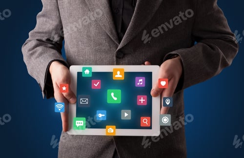 Preview: Casual Businessman Holding Tablet With Colorful Applications