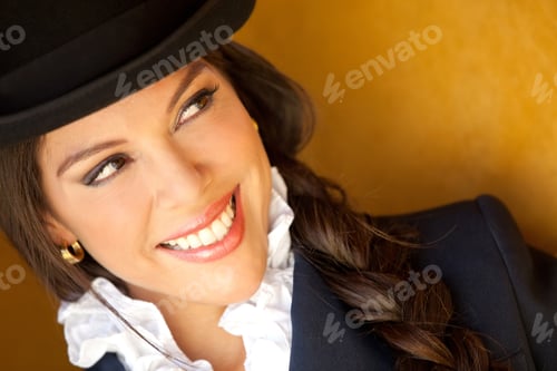 Preview: Portrait Of A Beautiful Horsewoman Wearing A Hat And Smiling