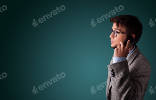 Preview: Man on Phone Wearing Suit Jacket