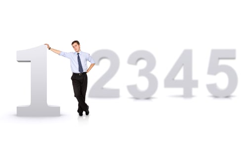 Preview: Business Number One Man In Front Of Other Numbers Isolated Over A White Background