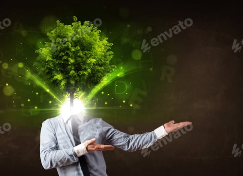 Preview: Man With Green Tree Head Concept On Brown Background