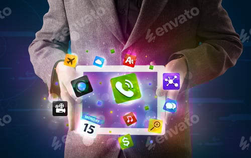 Preview: Young Businessman Holding A Tablet With Modern Colorful Apps And Icons
