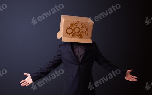 Preview: Young Man Standing And Gesturing With A Cardboard Box On His Head With Spur Wheels