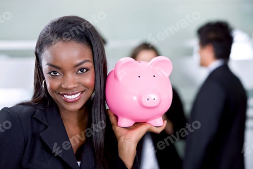Preview: Business Savings Of A Woman With A Piggy Bank