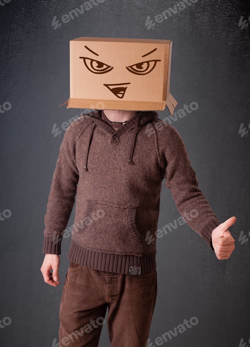 Preview: Young Man Standing And Gesturing With A Cardboard Box On His Head With Evil Face