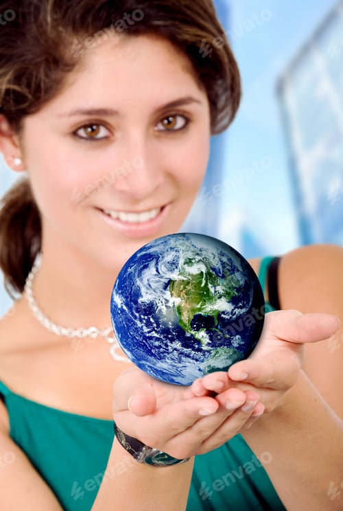 Preview: Business Woman Holding A Globe In Her Hands Good For A Worldwide Concept