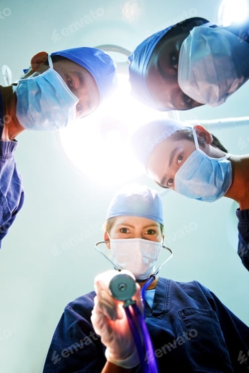 Preview: Group Of Doctors In A Hospital During Surgery
