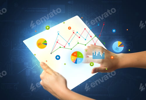 Preview: Young Female Hand Holding A Tablet With Colorful Charts