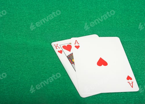 Preview: Ace And King Of Hearts Over A Green Felt