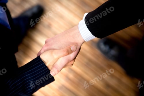 Preview: Business Handshake To Seal The Deal In An Office
