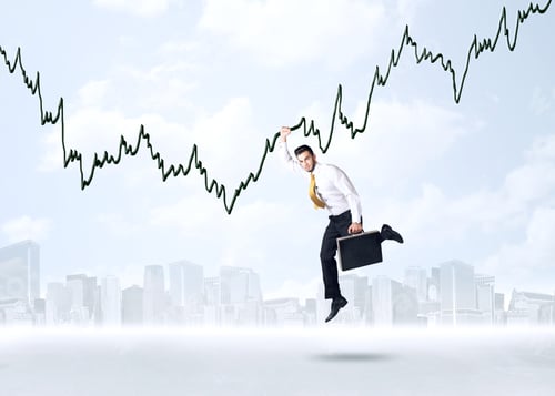 Preview: Businessman Hanging On A Graph Rope