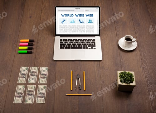 Vista previa: Ordenador portátil sobre escritorio de madera con material de oficina