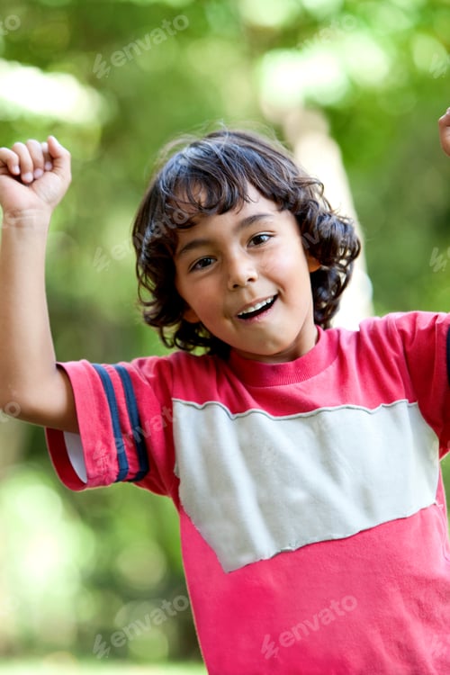 Preview: Little Latinamerican Boy Playing Outdoors And Smiling