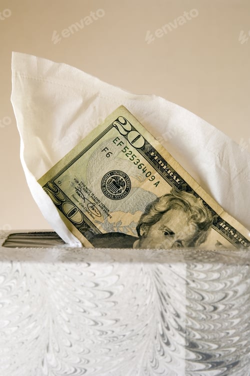 Preview: Twenty-Dollar Bill Emerging From Box Of White Tissues