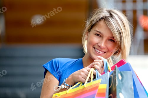 Preview: Beautiful Girl With Bags At The Shopping Center