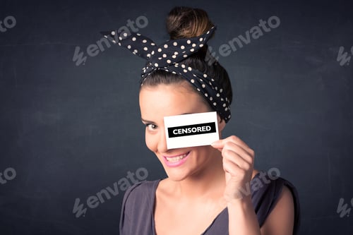 Preview: Pretty Girl With Censored Paper Sign Holding In Hand