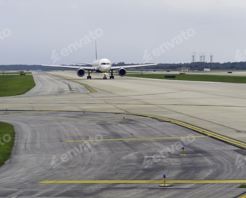 Preview: Passenger Jet Taxiing Along Runway Before Takeoff