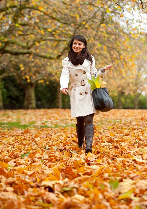 Preview: Autumn Woman Walking Outdoors At The Park