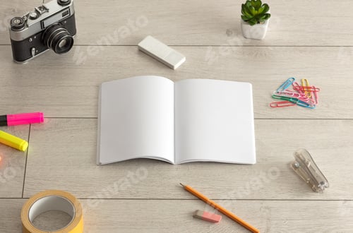 Preview: Empty Notebook On Wood Floor With Office Tools Nearby