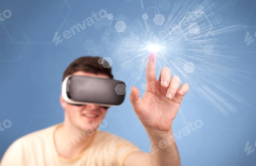 Preview: Young Impressed Man Wearing Virtual Reality Goggles With Blue Hexagons Around Him