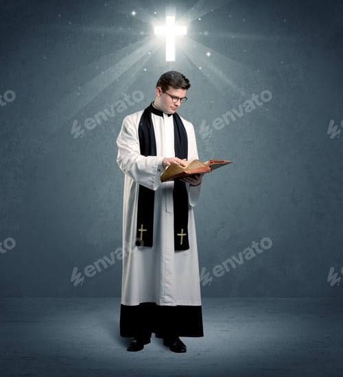 Preview: A Young Caucasian Priest With Deep Faith Blessing With The Holy Bible In His Hand In Front Of Blue