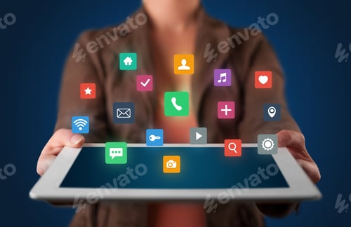 Preview: Casual Young Woman Holding Tablet With Colorful Applications