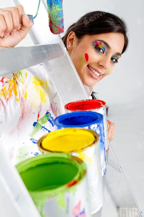 Preview: Female Painter With Paint Cans In Different Colors