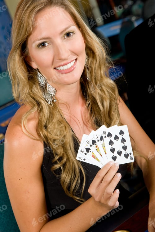 Preview: Woman Gambling At The Casino Showing A Royal Flush