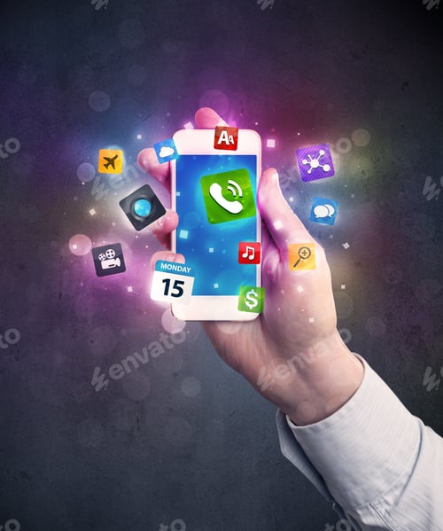 Preview: Caucasian Hand In Business Suit Holding A Smartphone With Colorful Media Icons