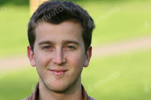 Preview: Casual Guy Smiling In A Park