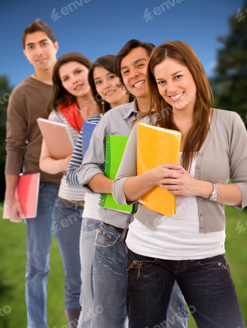 Preview: Group Of Students Lined Up Holding Notebooks Outdoors