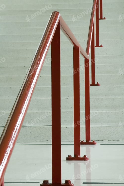 Preview: Red Handrail Along Off-White Staircase