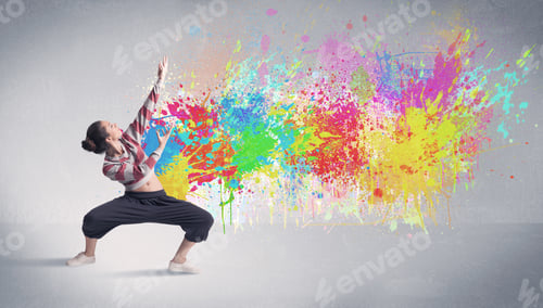 Preview: A Funky Contemporary Hip Hop Dancer Dancing In Front Of Grey Background With Colorful Bright Paint