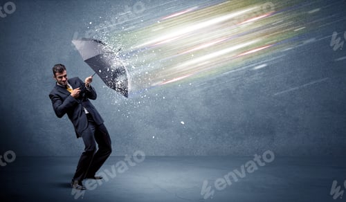 Preview: Business Man Defending Light Beams With Umbrella Concept On Background