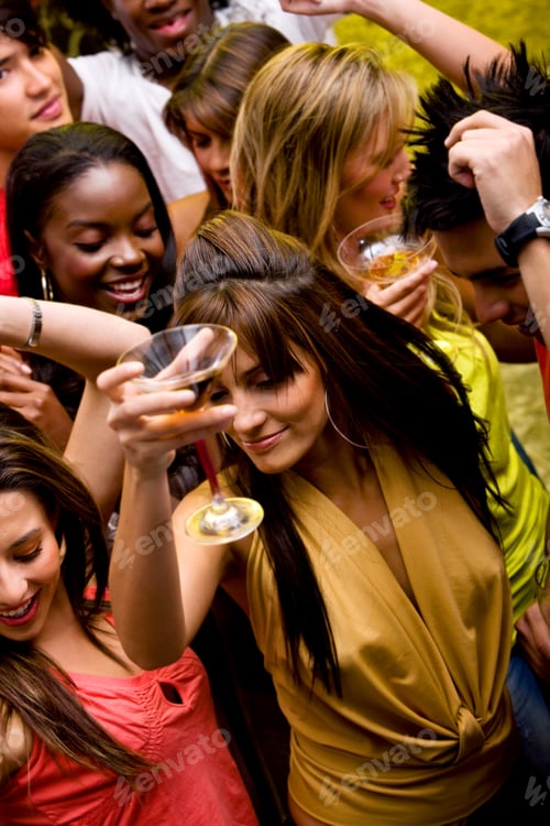 Preview: Group Of Happy Friends Dancing In A Nightclub