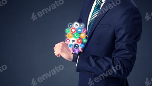 Preview: Businessman Wearing Smartwatch With Colored Application Symbols On It.