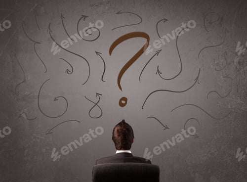 Preview: Business Man Looking At Question Mark Sketch On The Wall