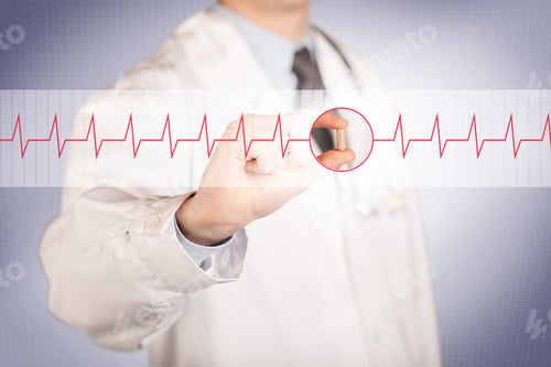 Preview: A Male Doctor In White Coat With A Stethoscope On One Shoulder Holding A Pill Between His Fingers
