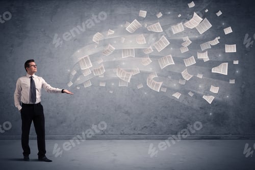 Preview: Caucasian Businessman Holding Newspapers, Which Are Floating Away From His Hands