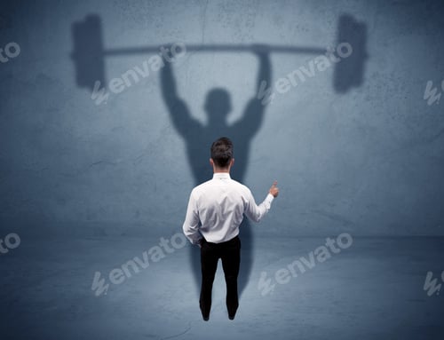 Preview: A Confident Young Elegant Salesman With Briefcase Facing A Wall, Looking At His Strong, Weight
