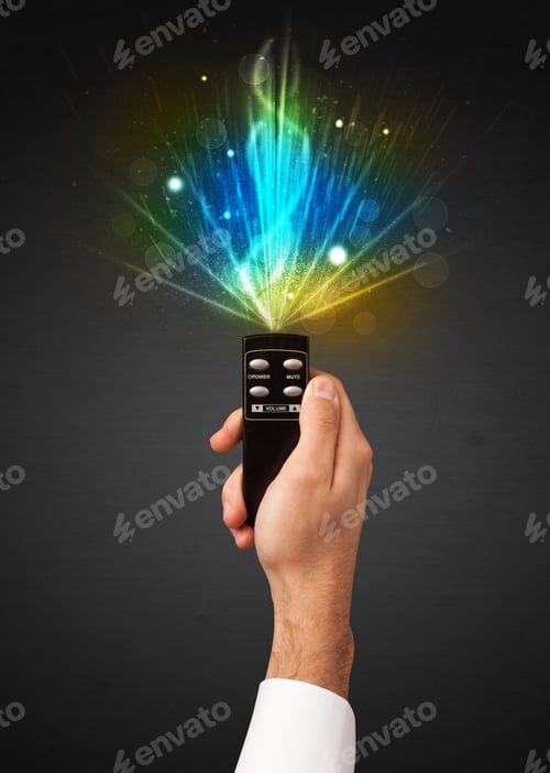 Preview: Hand Holding A Remote Control, Shining And Explosive Signal Coming Out Of It