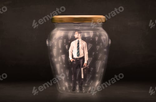 Preview: Business Man Trapped In Jar With Exclamation Marks Concept On Bakcground